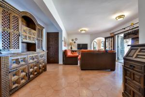 Ein Sitzbereich in der Unterkunft Villas Guzman - Flores