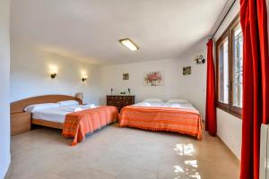 Ein Bett oder Betten in einem Zimmer der Unterkunft Villas Guzman - Flores