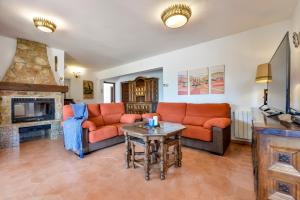 Ein Sitzbereich in der Unterkunft Villas Guzman - Flores