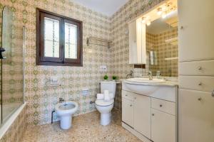 Ein Badezimmer in der Unterkunft Villas Guzman - Flores