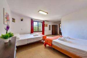 Ein Bett oder Betten in einem Zimmer der Unterkunft Villas Guzman - Flores