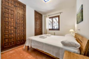 Ein Bett oder Betten in einem Zimmer der Unterkunft Villas Guzman - Flores