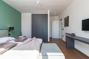 Postel nebo postele na pokoji v ubytování Villa Sabina