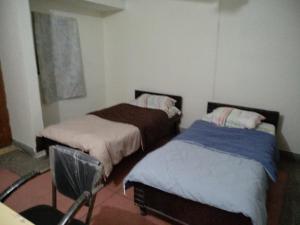 En eller flere senge i et værelse på Best Homestay,Centrally located,Chandigarh,160018