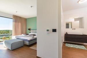 Postel nebo postele na pokoji v ubytování Villa Sabina