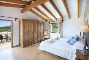 Posteľ alebo postele v izbe v ubytovaní Owl Booking Villa Tia - Exclusive Holidays