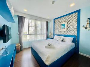 Postel nebo postele na pokoji v ubytování Baan Imm Aim Huahin sea view