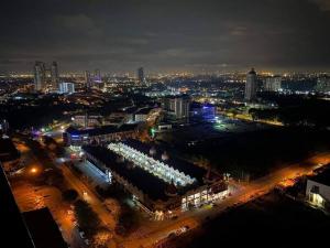 a view of a city at night with lights at SWEET HOME SKY GARDEN@BM in Bukit Mertajam