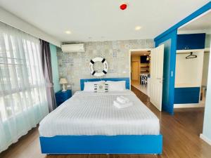 Postel nebo postele na pokoji v ubytování Baan Imm Aim Huahin sea view