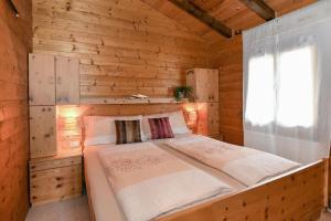 Posteľ alebo postele v izbe v ubytovaní Chalet Alpenblick
