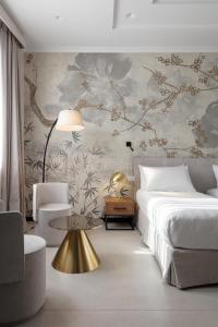 Posteľ alebo postele v izbe v ubytovaní Hotel Poerio 25 Boutique Stay