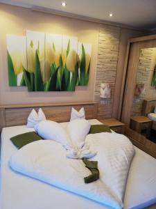 Posteľ alebo postele v izbe v ubytovaní Kék Lagúna Wellness Apartmanok