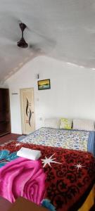 Ένα ή περισσότερα κρεβάτια σε δωμάτιο στο SHIV SAI HUTS