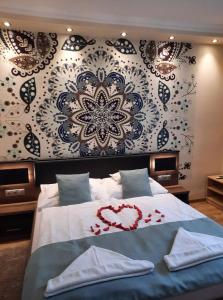 Posteľ alebo postele v izbe v ubytovaní Kék Lagúna Wellness Apartmanok