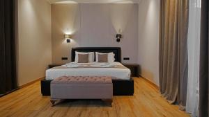 Letto o letti in una camera di Tskaltubo Hotel Prometheus