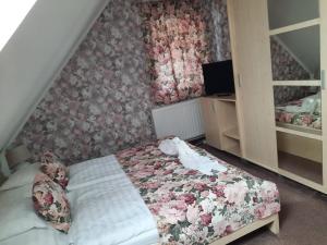 Posteľ alebo postele v izbe v ubytovaní Kék Lagúna Wellness Apartmanok