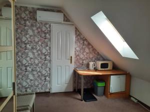 Kuchyňa alebo kuchynka v ubytovaní Kék Lagúna Wellness Apartmanok