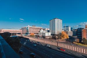 a view of a city with a highway and buildings at The Skyline Suite - *Private Balcony* *Views* in Glasgow