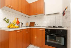 Kuchyň nebo kuchyňský kout v ubytování Apartment Nedjeljka