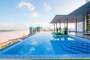 a swimming pool on the roof of a building at MekongView 6 CondoTel in Phnom Penh