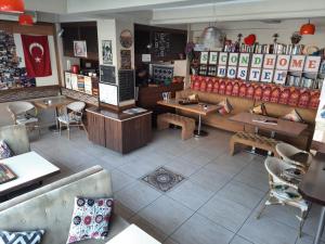 an overhead view of a restaurant with tables and chairs at Second Home Hostel in Istanbul