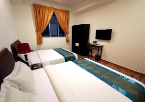 Säng eller sängar i ett rum på Comfort Hotel