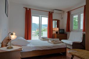 Postel nebo postele na pokoji v ubytování Apartments Marković