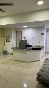 an empty room with a counter in a hospital at Staycity Apartment - D'Perdana Sri Cemerlang in Kota Bharu