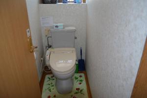 a bathroom with a toilet in a small room at Amakusa - House / Vacation STAY 5358 in Amakusa