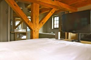 Llit o llits en una habitació de Fletcher Hotel-Restaurant Kasteel Coevorden