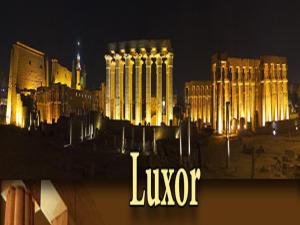 a view of a lit up city at night at Nile Cruises 5 Stars From From Aswan 03 Nights -From Luxor 04 Nights in Luxor