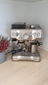 a kitchenaid espresso machine sitting on top of a counter at Ella's Lounge - besonders genießen in Singen
