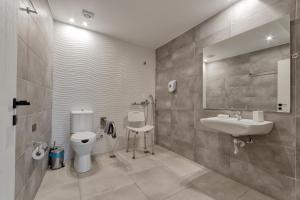Koupelna v ubytování Harma Boutique Hotel