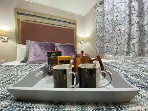 Postel nebo postele na pokoji v ubytování C04 - Beechwood Lodge with Hot Tub + 8 fotografií