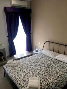 Llit o llits en una habitació de "Panoramic Terrazza - Napoli"