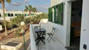 Ein Balkon oder eine Terrasse in der Unterkunft El Sueño - Appartamento fronte spiaggia vista mare