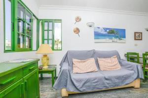 Ein Sitzbereich in der Unterkunft El Sueño - Appartamento fronte spiaggia vista mare