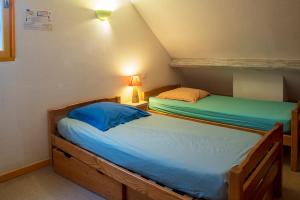 Postel nebo postele na pokoji v ubytování Maison Despourrins
