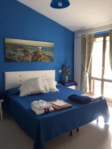 En eller flere senge i et værelse på Pousada Copacabana Praia - AFFITTACAMERE - Casa Vacanza a Porto Sant'Elpidio