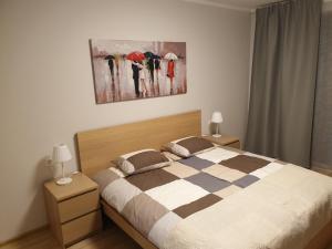 Postel nebo postele na pokoji v ubytování Raganas Ķēķis Hotel