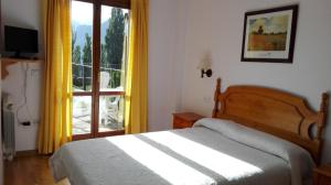Postel nebo postele na pokoji v ubytování Apartamentos Ball Benas Edificio Mirador