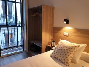 Postel nebo postele na pokoji v ubytování Norte Oviedo Rooms Madrid