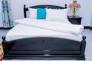 Katil atau katil-katil dalam bilik di Oxymos Homes