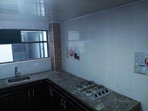 Η κουζίνα ή μικρή κουζίνα στο Living Robayo Paipa +11 φωτογραφίες
