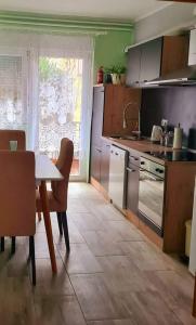 Kuchyň nebo kuchyňský kout v ubytování Apartman Goldy + 5 fotografií