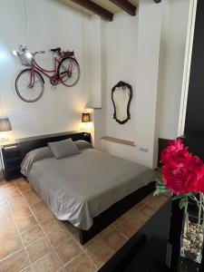 Postel nebo postele na pokoji v ubytování LOFT Del SOL, Centro del Pueblo con Aire Acondicionado