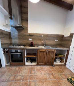 Kuchyň nebo kuchyňský kout v ubytování LOFT Del SOL, Centro del Pueblo con Aire Acondicionado