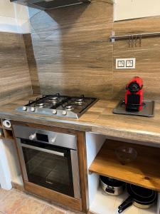 Kuchyň nebo kuchyňský kout v ubytování LOFT Del SOL, Centro del Pueblo con Aire Acondicionado