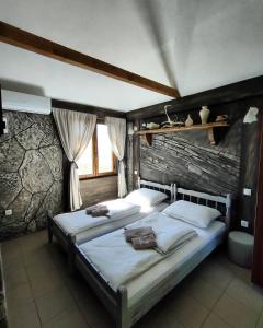 เตียงในห้องที่ Drinska laguna