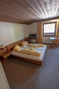 Postel nebo postele na pokoji v ubytování Appartement Pillersee